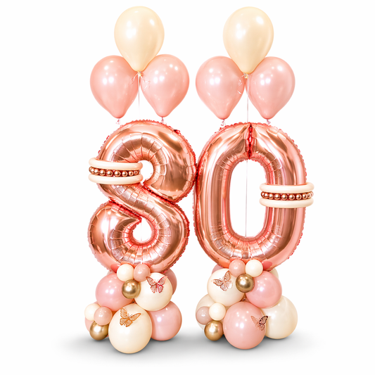 Rose gold 80 birthday balloon bouquet with elegant blush and gold balloons, luxury helium arrangement for milestone birthday celebration in Toronto