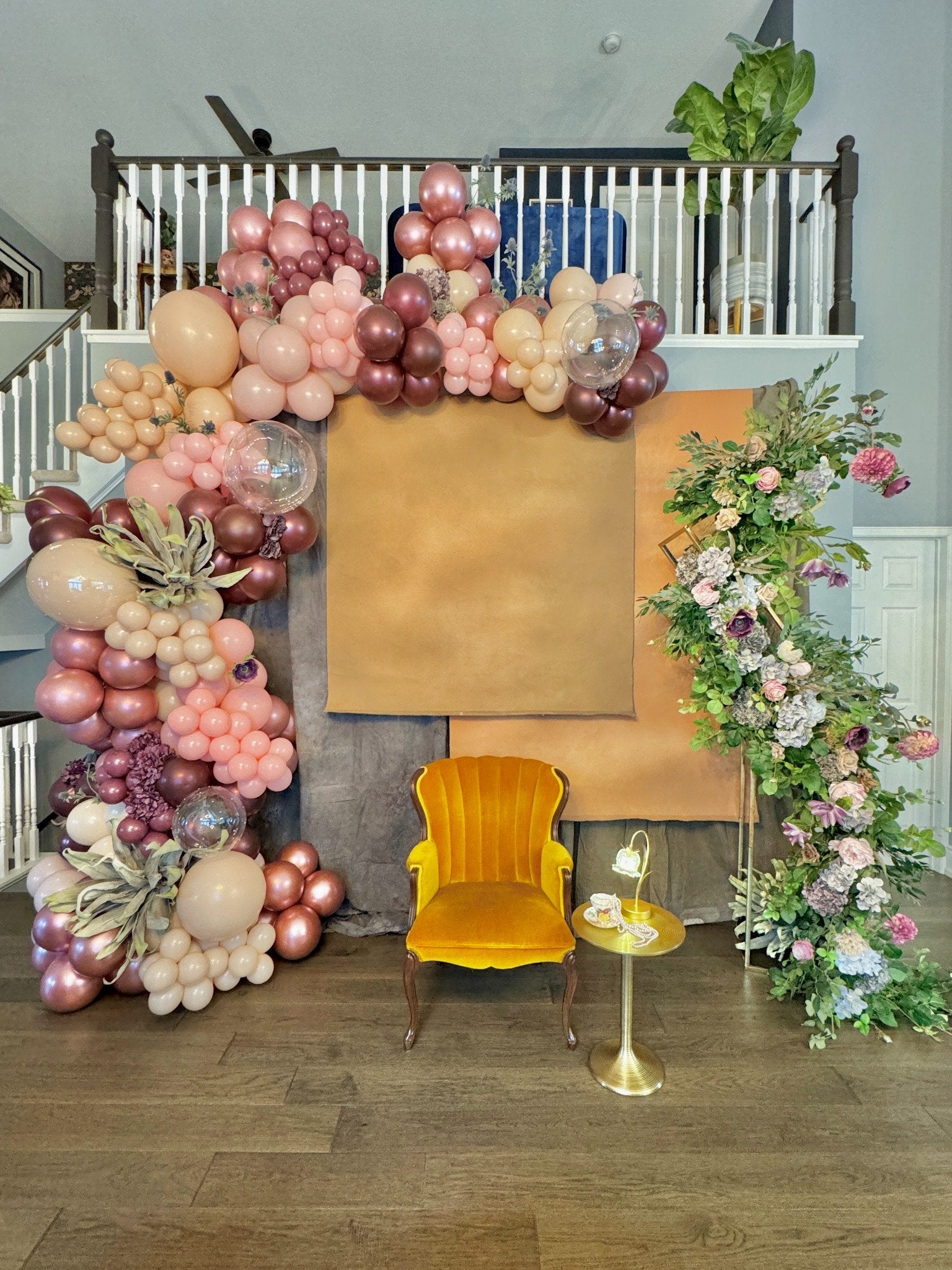 Rose gold balloon garland with floral backdrop Toronto