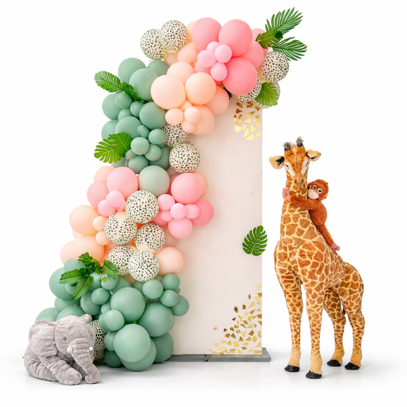 Safari themed balloon garland backdrop with giraffe and jungle elements in soft pink, peach and sage colors, perfect for baby shower and kids party decor in Toronto