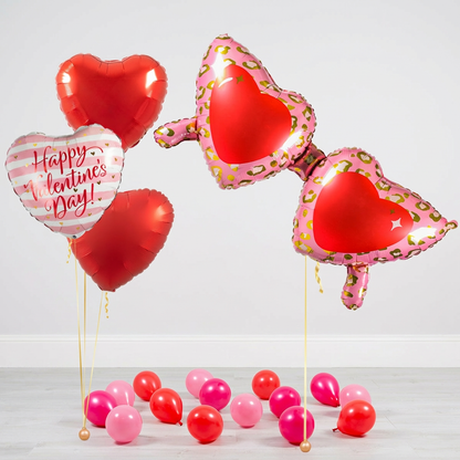 Saint Valentines balloons Toronto bouquet with glasses supershape, red heart helium balloons, and Happy Valentine’s Day balloon with weights