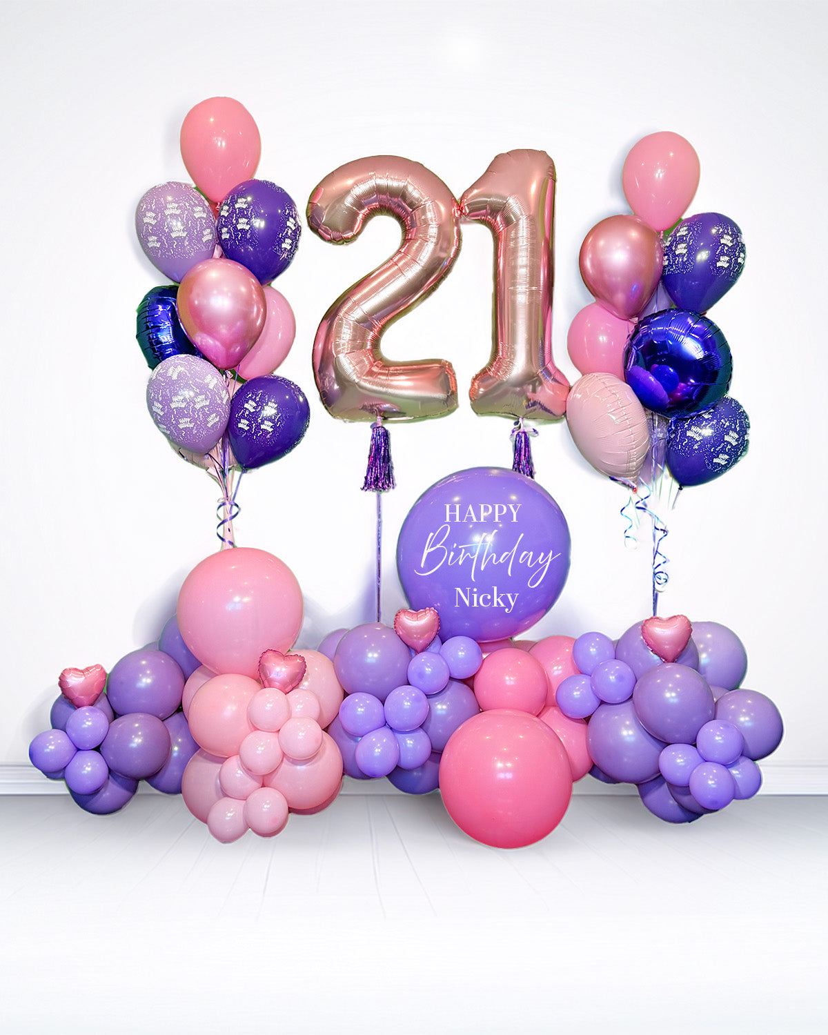Super Wooow Birthday Package Toronto – luxury pink and purple balloon setup with number balloons, heart accents, and personalized birthday sign by Wooow Balloons