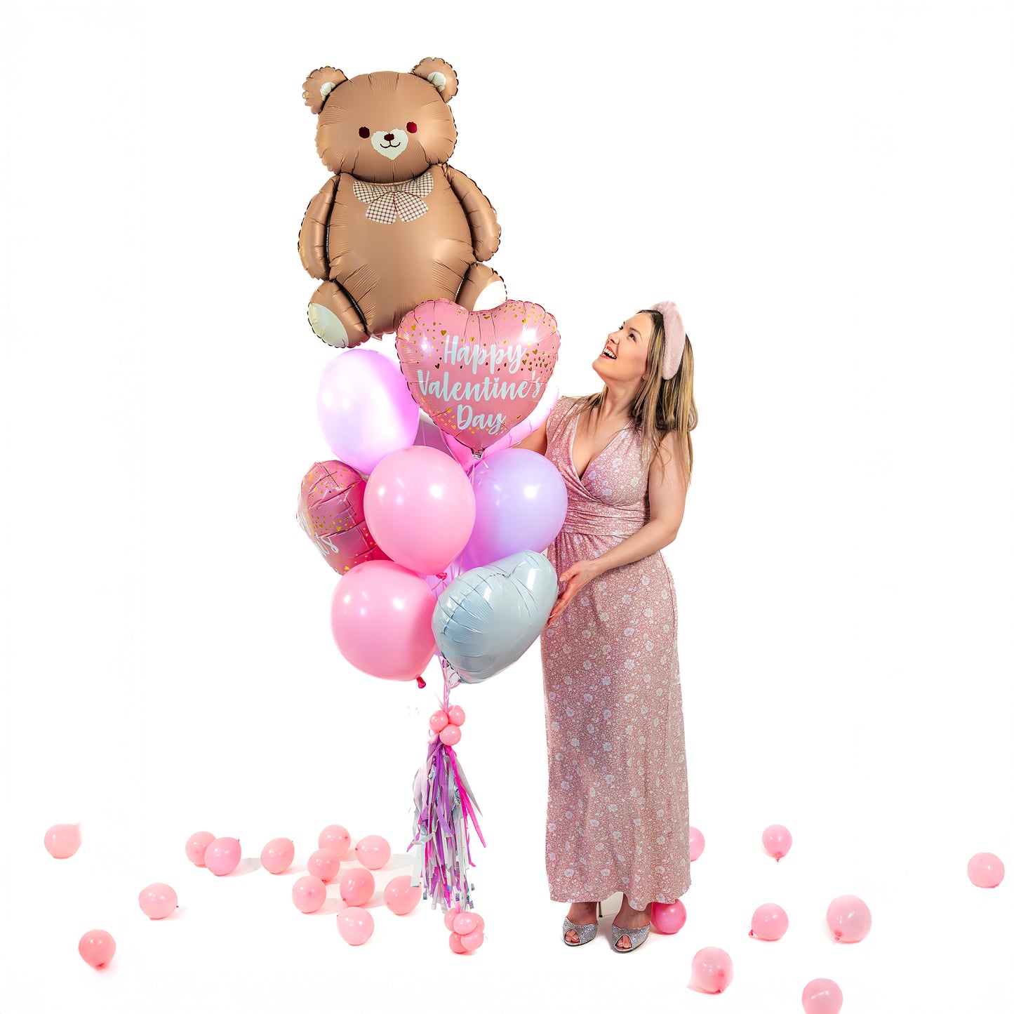 Teddy bear Valentines balloons in Toronto with pastel latex balloons and Valentine heart balloons.