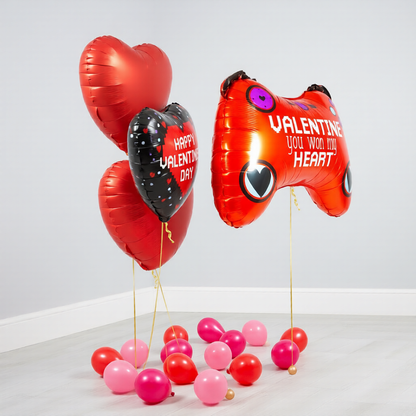 Valentine balloon bouquet in Toronto featuring a gamer supershape balloon with heart balloons, delivered helium-inflated with weights
