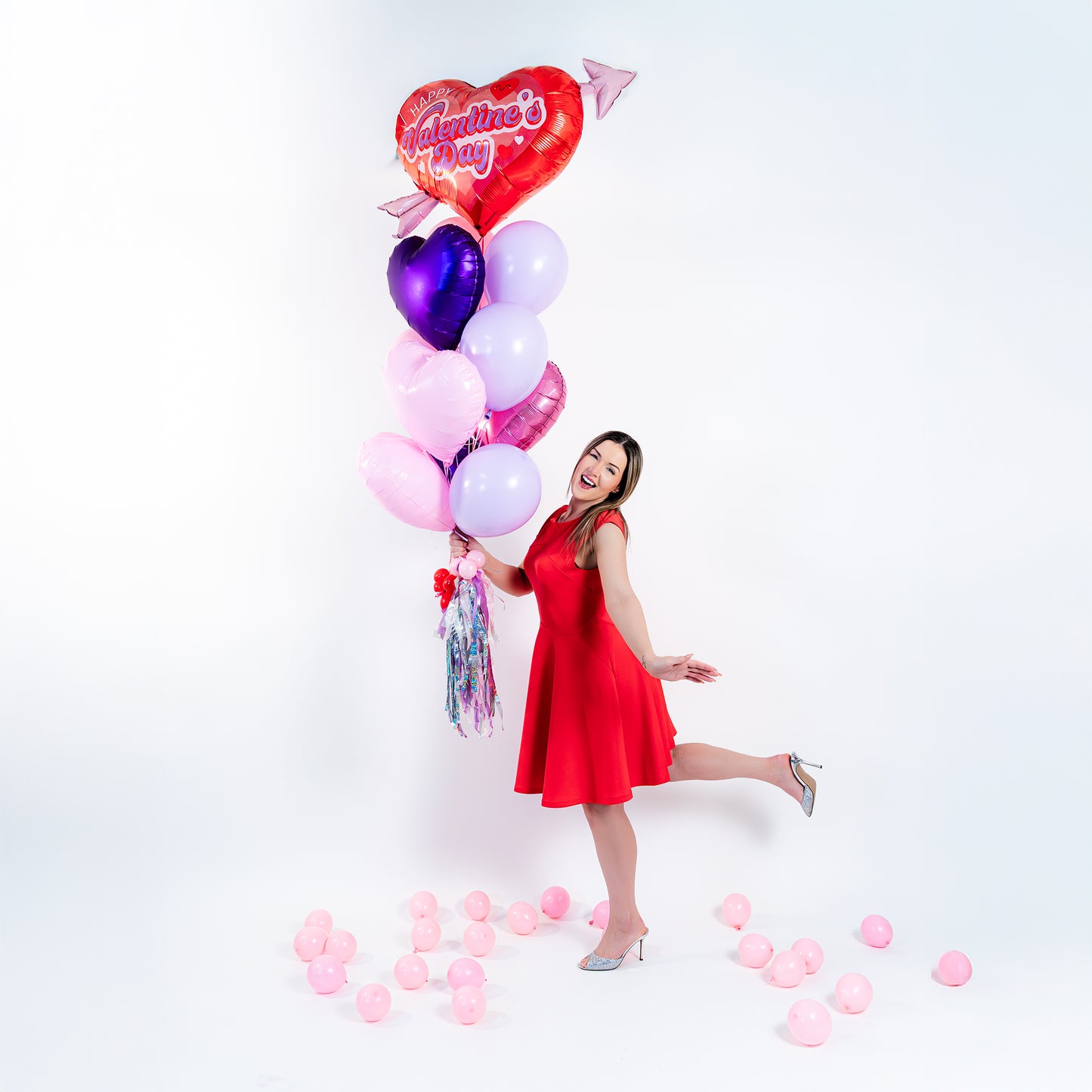 Valentine balloon bouquet Toronto featuring heart balloons and a retro Cupid heart supershape