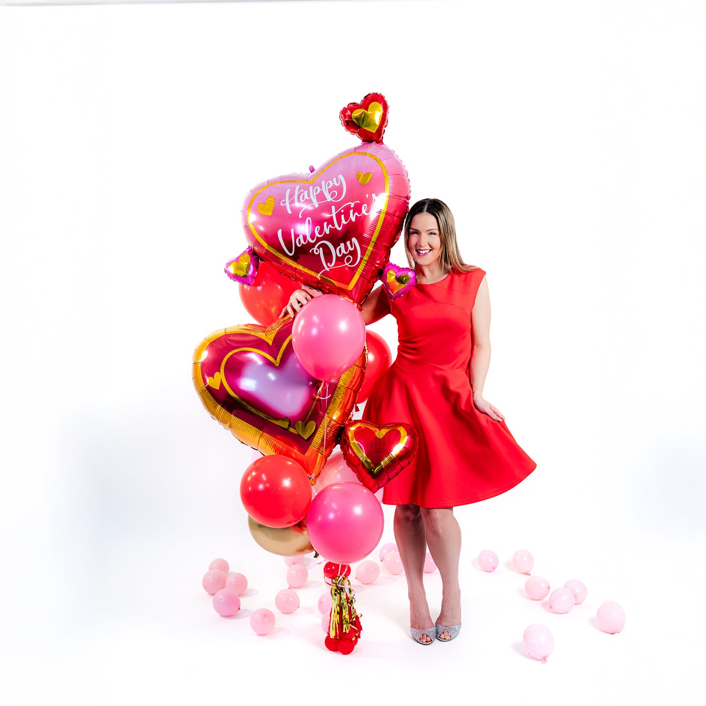 Valentine balloon bouquet Toronto featuring two heart supershape balloons and premium latex mix