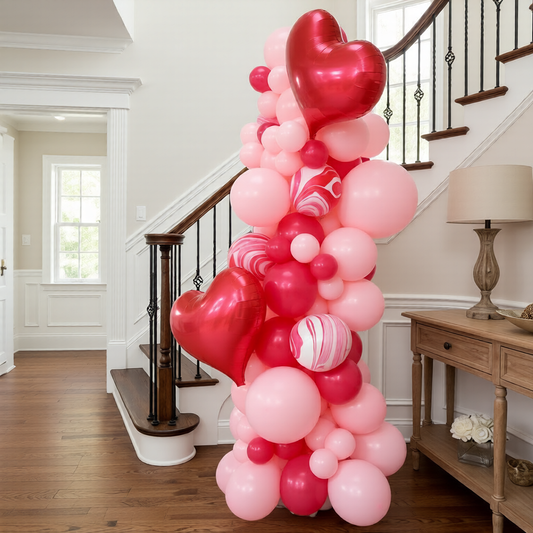 Valentines balloon decor Toronto featuring an air-filled balloon garland on a wall for Valentine’s Day dinner and party styling