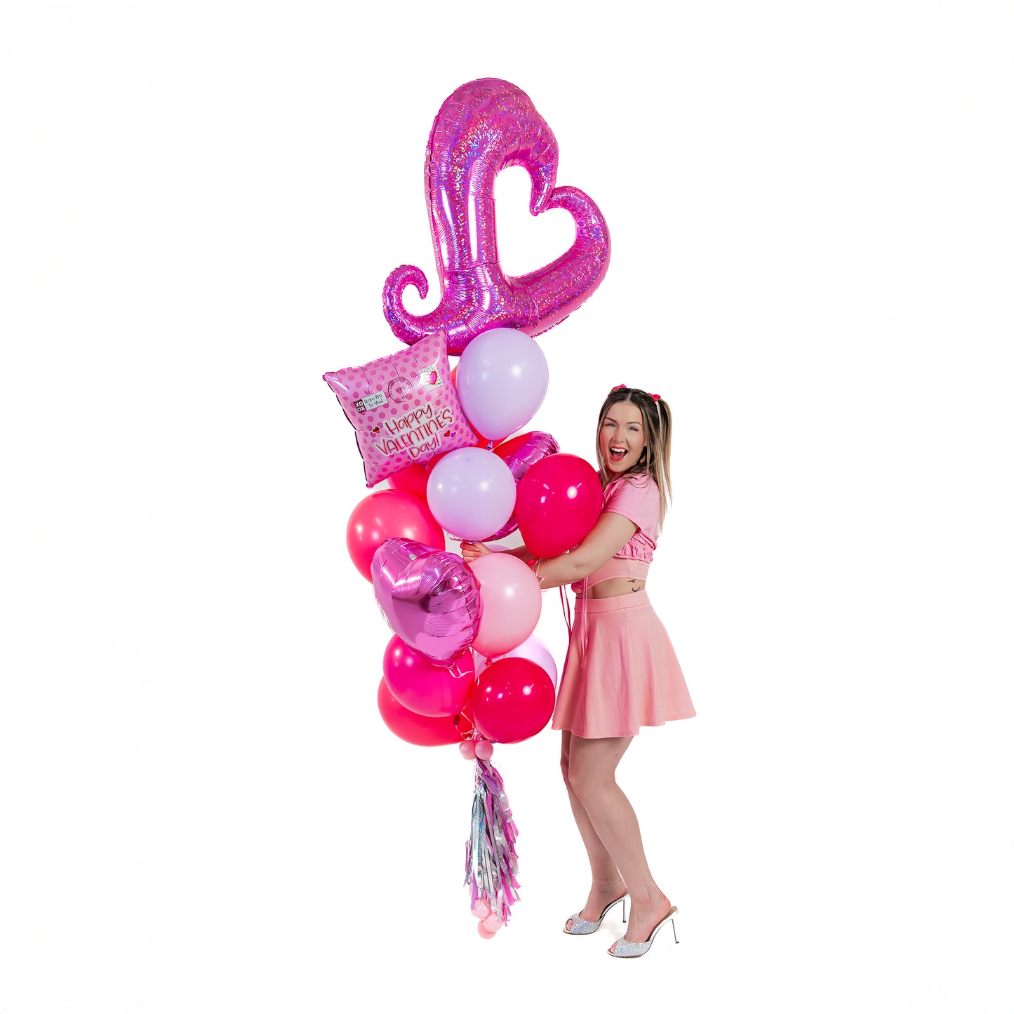 Valentines balloons in Toronto—woman holding a Love Mailbox balloon bouquet for a same-day delivery surprise.