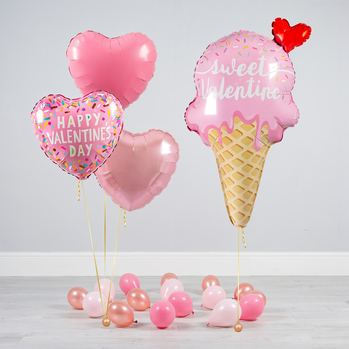 Valentine’s Day balloons Toronto ice cream balloon bundle with sweet pink ice cream supershape, pink heart helium balloons, and Happy Valentine’s Day heart balloon
