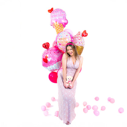 Valentine’s Day balloons in Toronto featuring Sweet Valentine foil supershapes and decorative tassel tail.
