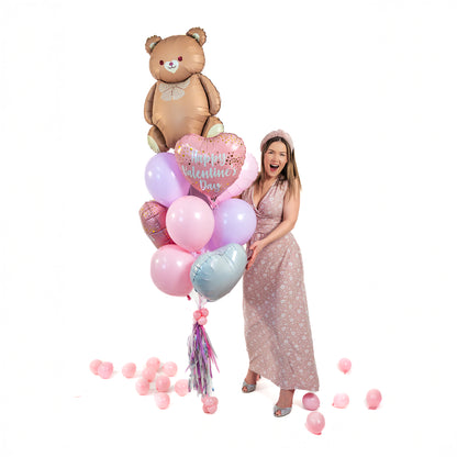 Valentine’s Day balloon bouquet in Toronto featuring a teddy bear supershape and heart foil balloon.