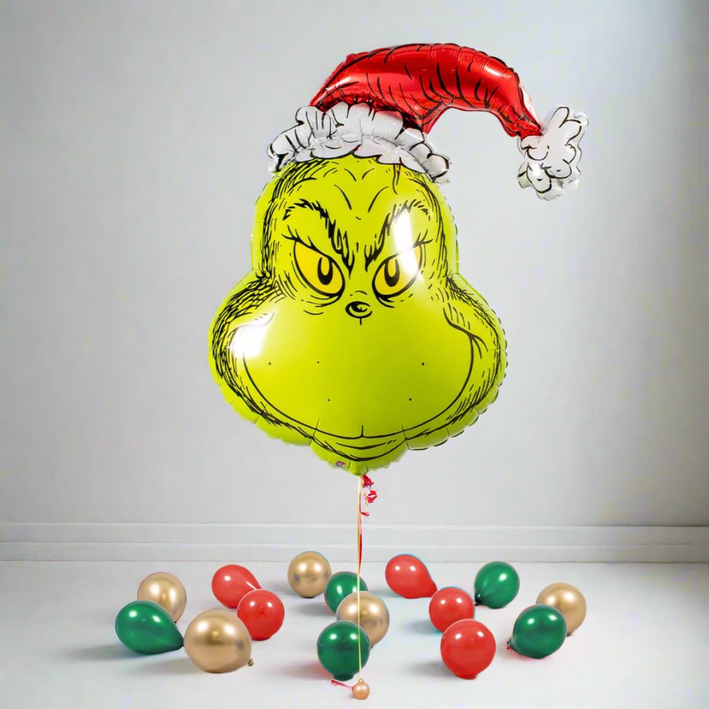 Merry Grinchmas Inflated Christmas Balloon Package featuring Grinch supershape and "Merry Grinchmas" foil balloons