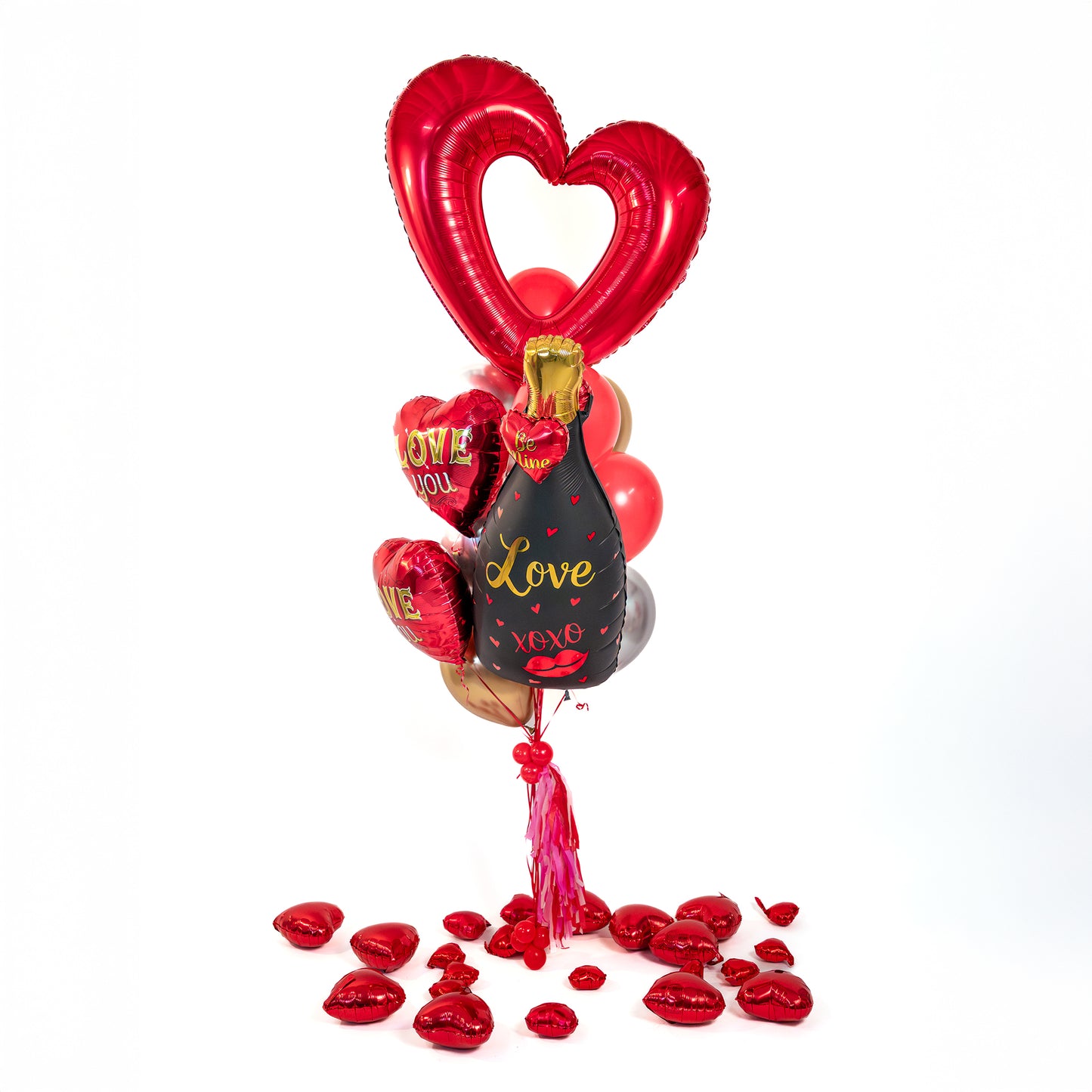 XOXO champagne balloon bouquet with red heart and gold accents