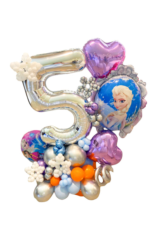 Frozen-themed balloon arrangement with Elsa and number balloon for a birthday celebration.